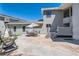 The backyard features ample space for entertaining with multiple seating areas at 4075 E Oquendo Rd, Las Vegas, NV 89120