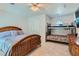 Neutral bedroom with a bunk bed set and a queen bed at 4075 E Oquendo Rd, Las Vegas, NV 89120
