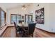 Bright dining room with a large table and seating for six, perfect for Gathering meals at 4075 E Oquendo Rd, Las Vegas, NV 89120
