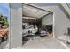 Spacious garage with high ceilings and multiple bays, perfect for storing vehicles and equipment at 4075 E Oquendo Rd, Las Vegas, NV 89120