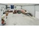 Expansive garage featuring ample space for multiple vehicles, boat, and a motorcycle at 4075 E Oquendo Rd, Las Vegas, NV 89120