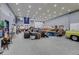 Huge garage space with boats, cars, and tons of equipment, perfect for hobbies and storage at 4075 E Oquendo Rd, Las Vegas, NV 89120