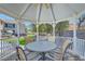 Enjoy outdoor dining in this backyard gazebo, complete with table and chairs at 4075 E Oquendo Rd, Las Vegas, NV 89120