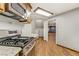 Stainless steel oven and granite counters are visible in this open kitchen at 4075 E Oquendo Rd, Las Vegas, NV 89120