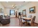 Living room with wood-look floors, comfortable seating and decor at 4075 E Oquendo Rd, Las Vegas, NV 89120