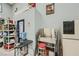 A pet washing station in a garage including a stainless steel sink, a table, and a grooming arm at 4075 E Oquendo Rd, Las Vegas, NV 89120
