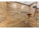 Walk-in shower with tile walls and a rain shower head at 4075 E Oquendo Rd, Las Vegas, NV 89120