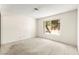 Bright bedroom features a large window bringing in ample natural light at 433 Old Palms Dr, Las Vegas, NV 89123