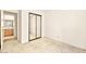 Bedroom with a door and a mirrored closet at 433 Old Palms Dr, Las Vegas, NV 89123