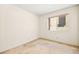 Neutral bedroom with bright light from a large window and ample wall space at 433 Old Palms Dr, Las Vegas, NV 89123