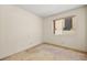 Bright bedroom with a window offering natural light at 433 Old Palms Dr, Las Vegas, NV 89123