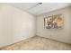 Bedroom with neutral walls, carpet, and natural light from a side window at 433 Old Palms Dr, Las Vegas, NV 89123