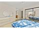 Comfortable bedroom with a closet, dresser and ample natural light at 433 Old Palms Dr, Las Vegas, NV 89123