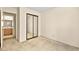 Bedroom with neutral walls, carpet, and sliding mirrored closet at 433 Old Palms Dr, Las Vegas, NV 89123