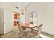Cozy dining area with table, chairs, and adjacent doorway to kitchen at 433 Old Palms Dr, Las Vegas, NV 89123