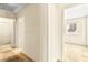 Hallway showcasing access to multiple rooms with neutral walls and carpeting at 433 Old Palms Dr, Las Vegas, NV 89123