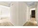 Hallway featuring neutral walls and carpeting with access to rooms at 433 Old Palms Dr, Las Vegas, NV 89123