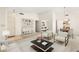 Staged living room showcases the home's open floor plan, neutral tones and natural light at 433 Old Palms Dr, Las Vegas, NV 89123