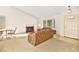Bright living room featuring cozy sofas, fireplace, and lots of natural light at 433 Old Palms Dr, Las Vegas, NV 89123