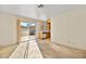 Bright, airy room with a sliding glass door and view of the kitchen at 433 Old Palms Dr, Las Vegas, NV 89123