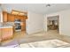 Bright, airy living room connecting to kitchen and other living spaces at 433 Old Palms Dr, Las Vegas, NV 89123
