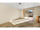 Bright living room features sliding glass doors to the outdoor space at 433 Old Palms Dr, Las Vegas, NV 89123