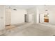Neutral living room with open floor plan, adjoining kitchen and dining area at 433 Old Palms Dr, Las Vegas, NV 89123
