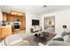 Open floorplan view of kitchen, living room, and bright front room at 433 Old Palms Dr, Las Vegas, NV 89123