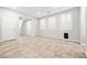 Large, well-lit living area featuring neutral tones, tile floors, and ample natural light at 4519 Stardusk Falls Ave, North Las Vegas, NV 89084
