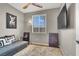 Cozy bedroom with natural light, soft carpet, and tasteful decor at 50 Aura De Blanco St # 18204, Henderson, NV 89074
