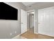 Bedroom with hardwood floors and view to hallway with closet space at 50 Aura De Blanco St # 18204, Henderson, NV 89074