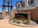 The Villa Azure entrance sign is surrounded by landscaping and provides neighborhood identification at 50 Aura De Blanco St # 18204, Henderson, NV 89074