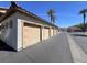 A row of detached garages offers ample parking for residents in the community at 50 Aura De Blanco St # 18204, Henderson, NV 89074