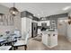 Modern kitchen open to a dining area, featuring stainless steel appliances at 50 Aura De Blanco St # 18204, Henderson, NV 89074