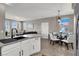 Open concept living area flows from kitchen to dining and living room at 50 Aura De Blanco St # 18204, Henderson, NV 89074