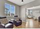 Spacious living area with wood floors and an open design at 50 Aura De Blanco St # 18204, Henderson, NV 89074