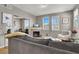 Comfortable living room featuring a fireplace, lots of natural light, and neutral decor at 50 Aura De Blanco St # 18204, Henderson, NV 89074