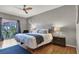 Bright and comfortable main bedroom with balcony access at 50 Aura De Blanco St # 18204, Henderson, NV 89074