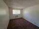 This bedroom features neutral-toned walls and soft carpeting creating a serene and inviting atmosphere at 5390 Swenson St # 27, Las Vegas, NV 89119