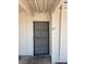 Entry door with security screen and the number 27 to the right at 5390 Swenson St # 27, Las Vegas, NV 89119