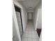 Hallway with storage and tile floor at 5390 Swenson St # 27, Las Vegas, NV 89119
