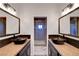 Stylish bathroom with dual sinks, wood countertops, and a glass-enclosed shower at 5725 N Durango Dr, Las Vegas, NV 89149