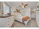 Bright bedroom features a cozy bed, dresser, and modern decor accents at 5725 N Durango Dr, Las Vegas, NV 89149