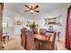 This dining room features seating for eight and an open floor plan at 5725 N Durango Dr, Las Vegas, NV 89149