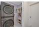 This laundry room features a modern washer and dryer set at 5725 N Durango Dr, Las Vegas, NV 89149