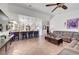 Bright living room showcases open-concept design, kitchen access, and comfortable seating arrangement at 5725 N Durango Dr, Las Vegas, NV 89149
