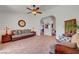 This living room features a sofa and tile flooring at 5725 N Durango Dr, Las Vegas, NV 89149