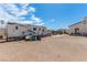 Spacious backyard with a camper, ample parking, and a brick paved area at 60 N Fogg St, Las Vegas, NV 89110