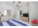 Neutral bedroom featuring large dresser and attached bathroom access at 60 N Fogg St, Las Vegas, NV 89110