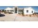 Inviting single story home featuring a desert landscape, covered porch, and long driveway at 60 N Fogg St, Las Vegas, NV 89110